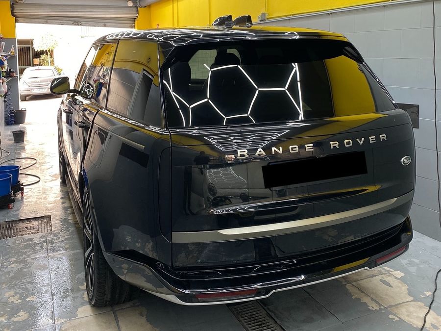 Range Rover at our car wash under the hexagonal LED ceiling